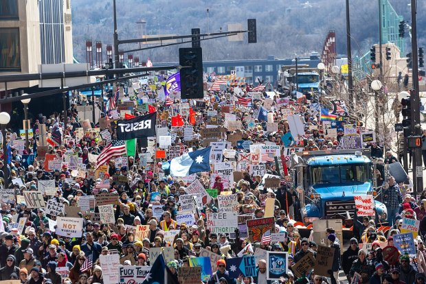 People march during the "No Kings" rally in St Paul, Minnesota People march during the "No Kings" rally in St Paul, Minnesota
